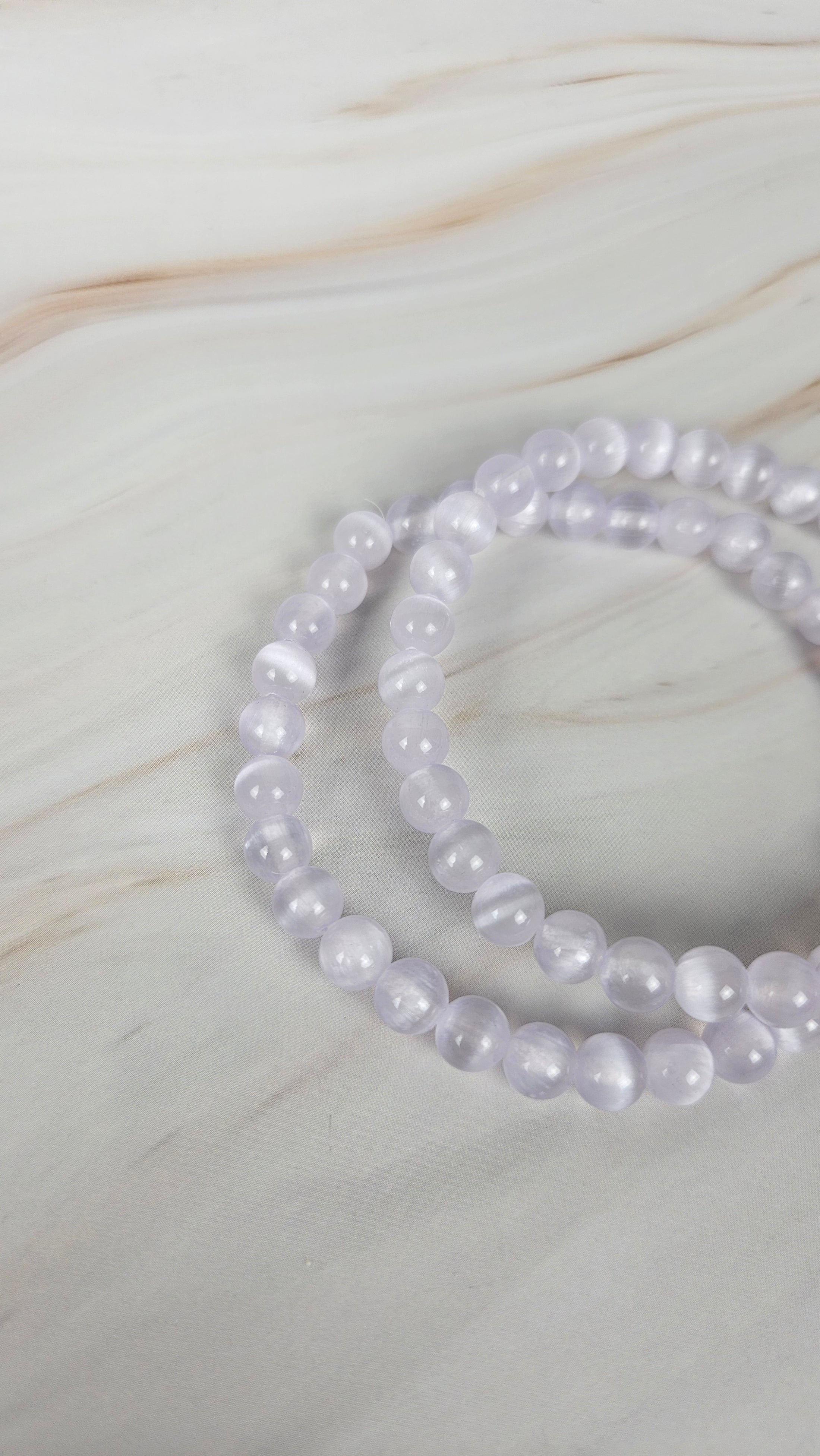 Selenit Kugelarmband in Lila (14sel)